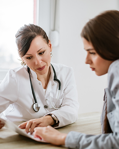 Image of a doctor and patient speaking