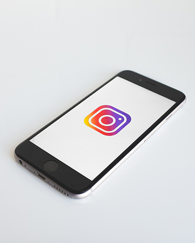 Image of phone with instagram logo