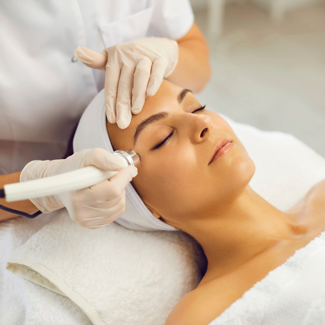 Image of a woman getting facial treatment