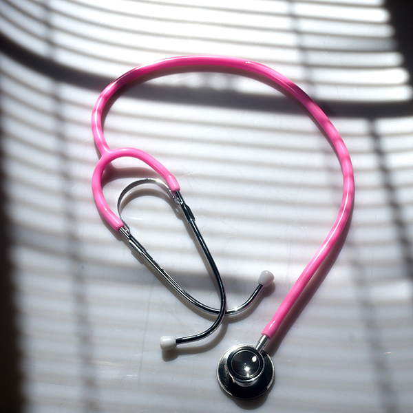 Pink Stethoscope on a table