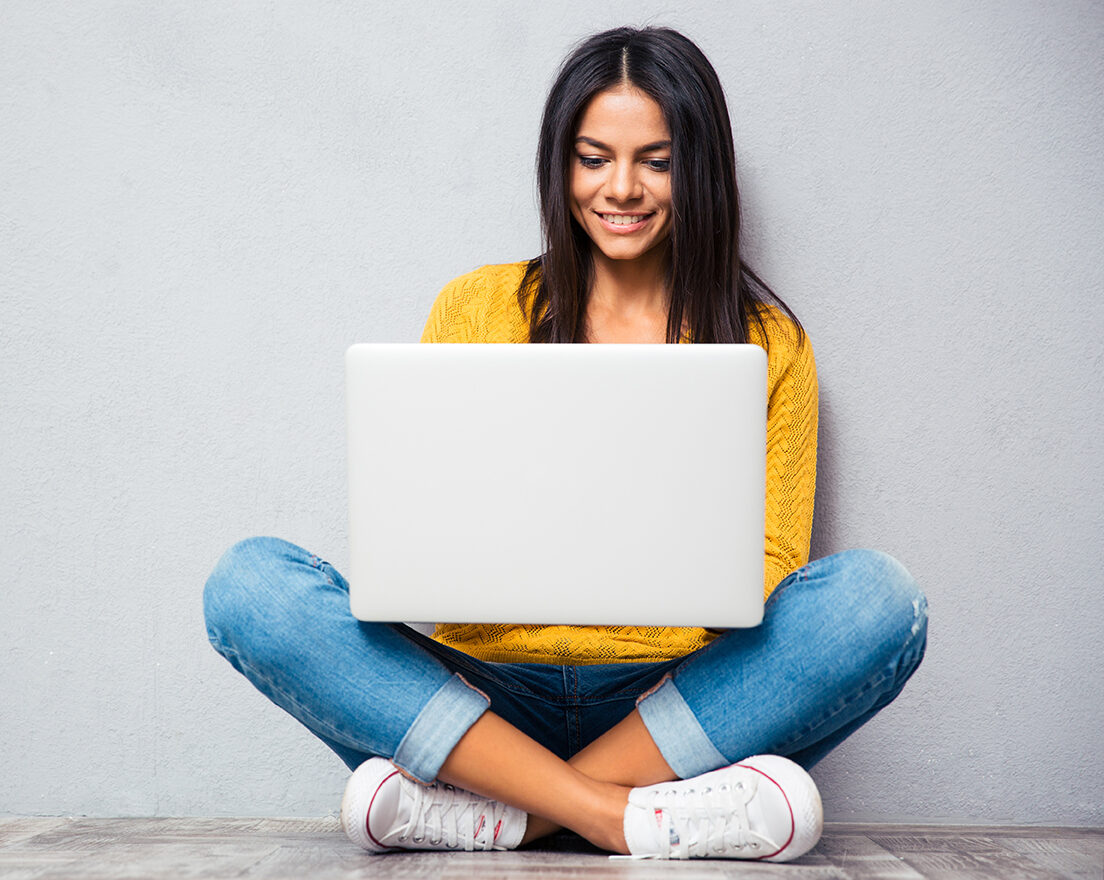 Image of a woman on her laptop