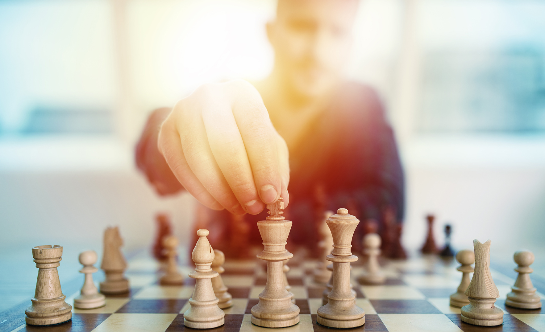 Image of man playing chess