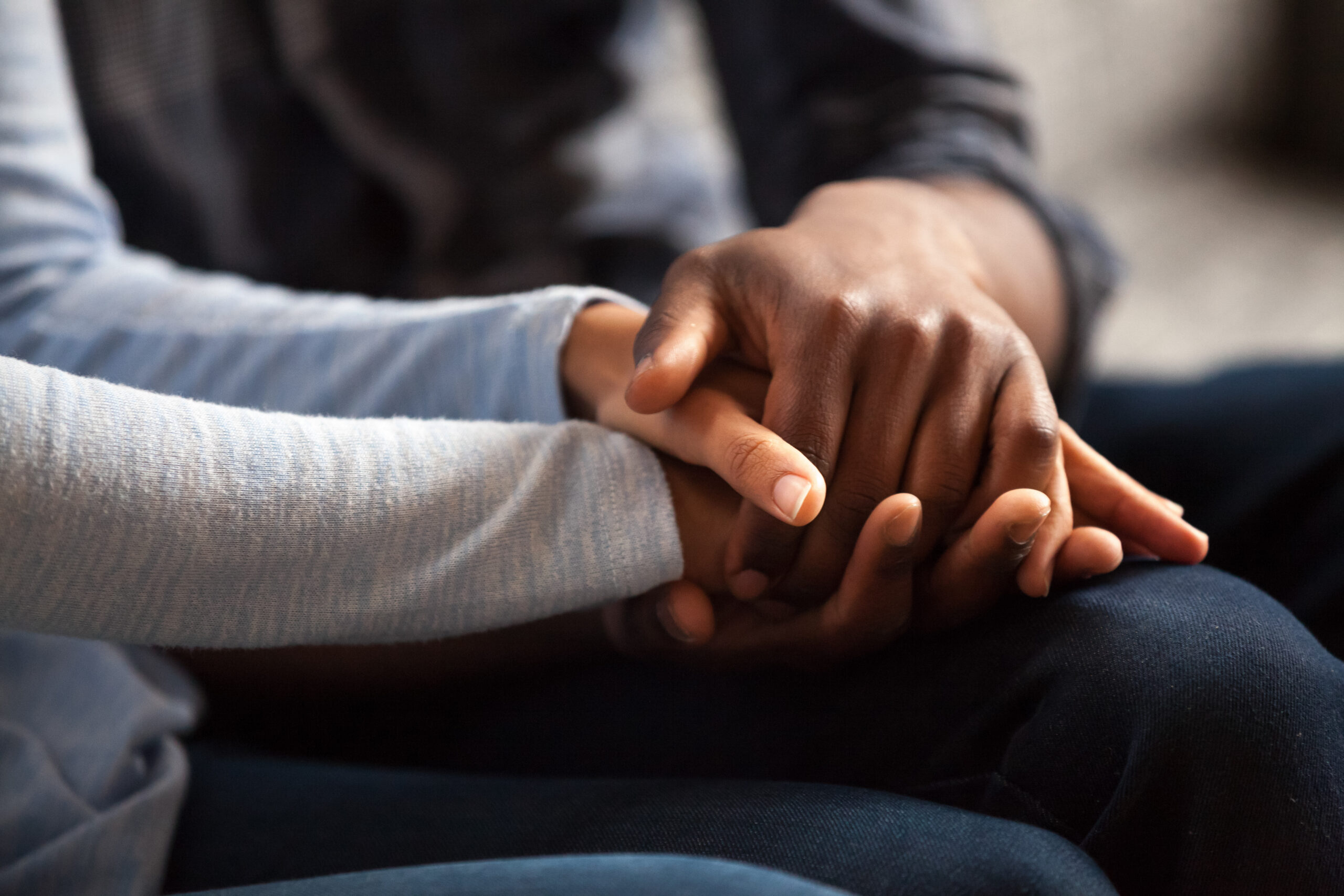 Image of people holding hands