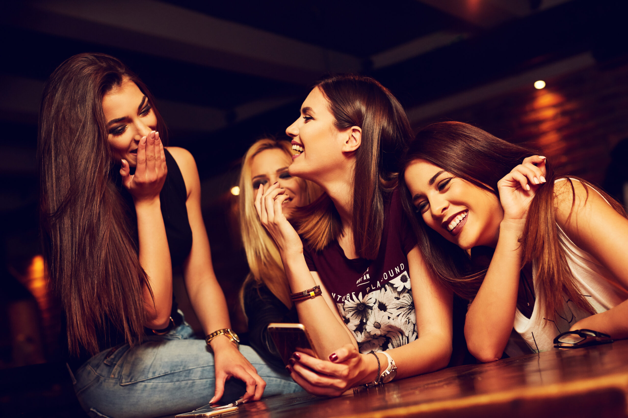 Image of women speaking with one another