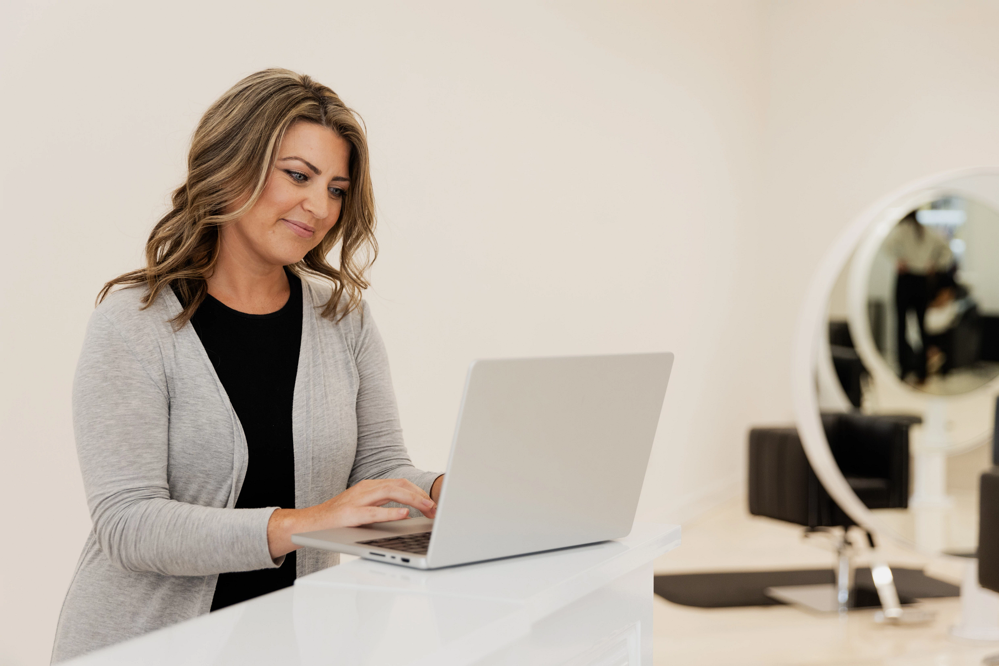 Image of a woman on a laptop